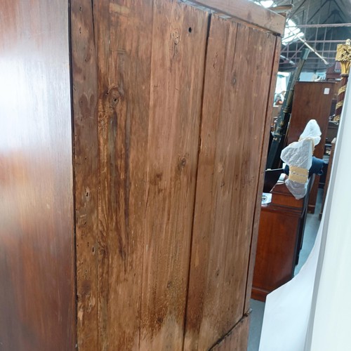 111 - A Victorian mahogany wardrobe, 117 cm wide x 203 cm high