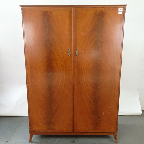 112 - A mahogany wardrobe, 118 cm wide x 176 cm high