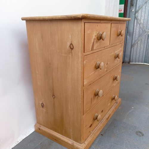 116 - A pine chest, having two short and three long drawers, 88 cm wide