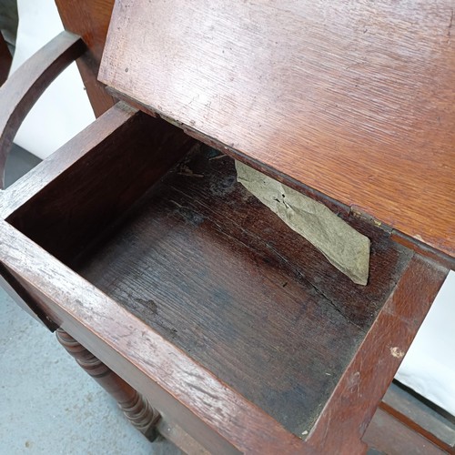 126 - An Edwardian mahogany hall stand, inset with two tiles, 81 cm wide