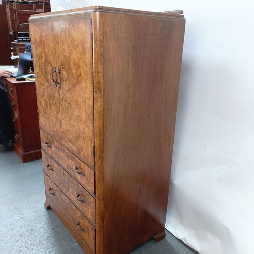 129 - An Art Deco burr walnut gentleman's wardrobe, 74 cm wide