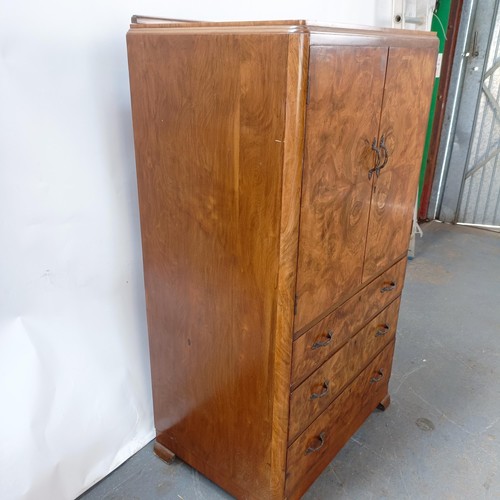 129 - An Art Deco burr walnut gentleman's wardrobe, 74 cm wide