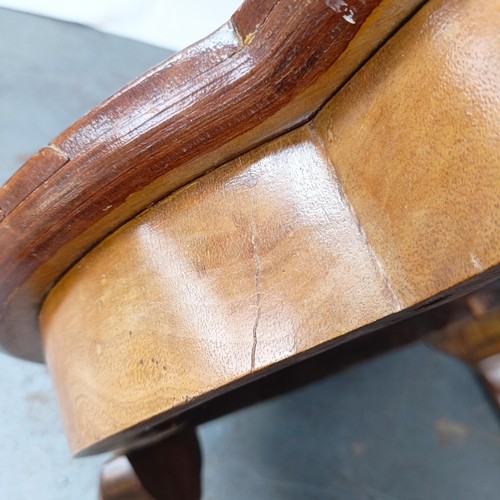 130 - A burr walnut coffee table, 65 cm wide