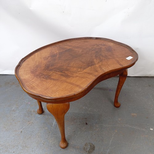 130 - A burr walnut coffee table, 65 cm wide