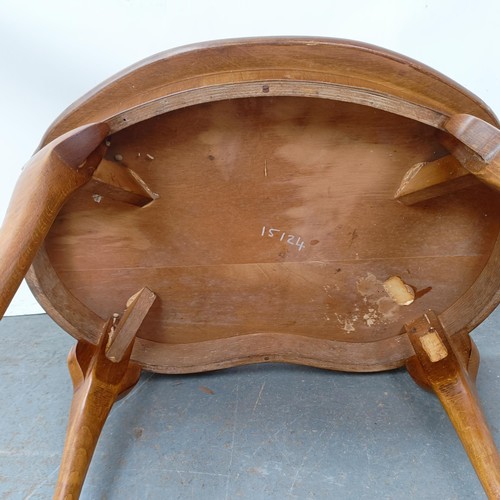 131 - A burr walnut kidney shaped coffee table, 69 cm wide.