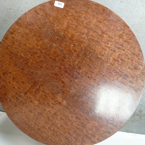 134 - A mahogany coffee table, 60 cm diameter