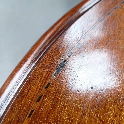 137 - An Edwardian mahogany lamp table, 58 cm wide