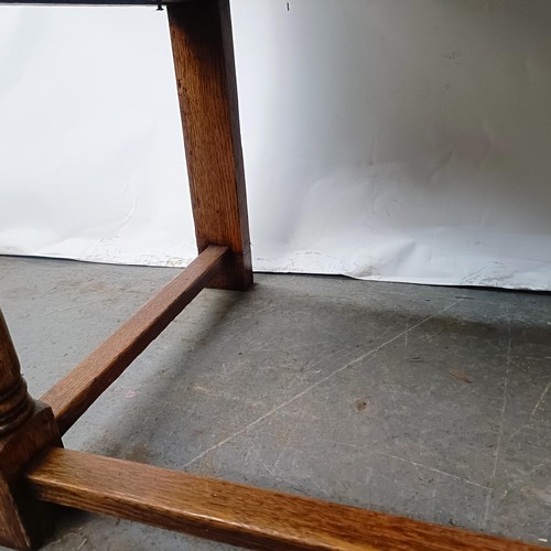 139 - A 17th century style oak cabinet, with carved decoration, 92 cm wide