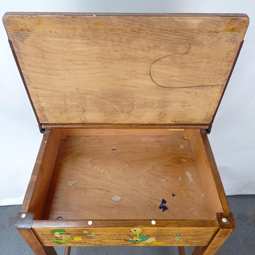 141 - An oak school desk, 56 cm wide