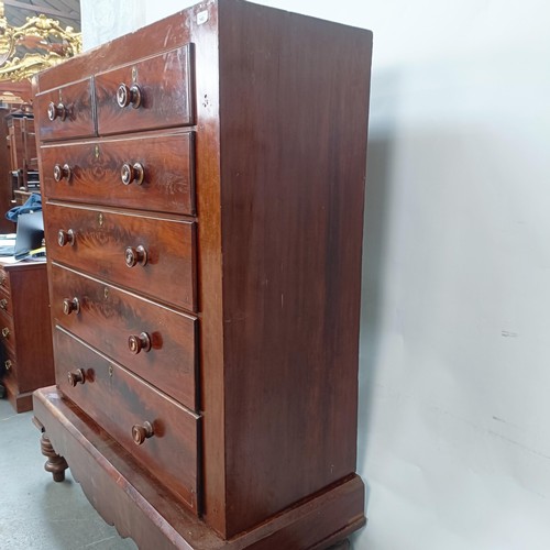 142 - A Victorian mahogany chest, of two short and four long drawers, on a base with turned feet, 128 cm w... 