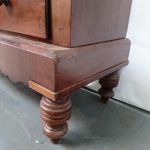 142 - A Victorian mahogany chest, of two short and four long drawers, on a base with turned feet, 128 cm w... 