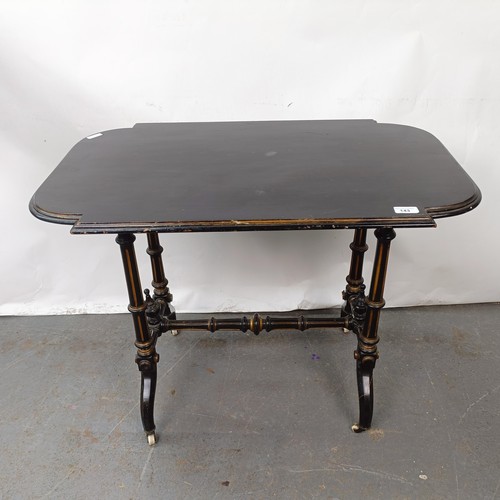 143 - A late 19th century ebonised side table, 82 cm wide