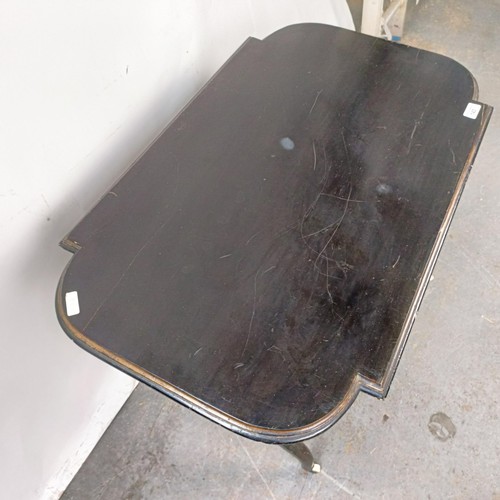 143 - A late 19th century ebonised side table, 82 cm wide