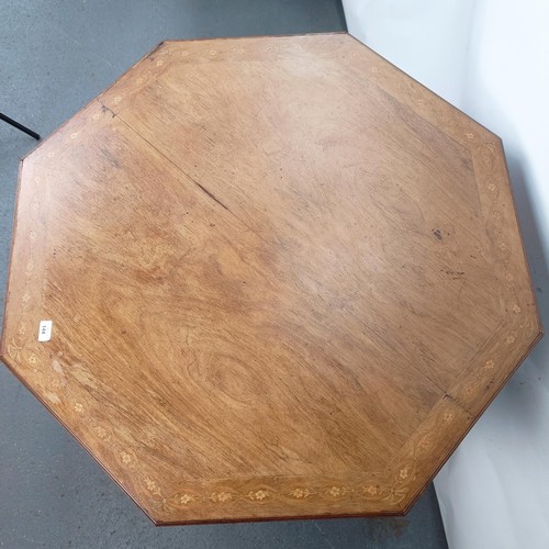 144 - An Edwardian walnut lamp table, 100 cm wide