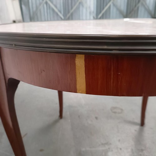 145 - A late 19th century French walnut and marble topped table with gilt metal mounts, 56 cm diameter