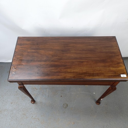 146 - A Georgian mahogany folding tea table, on cabriole legs and pad feet, 92 cm wide