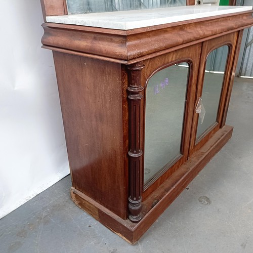 153 - A Victorian mahogany chiffonier with a mirrored back, the base with a marble top, and two mirrored c... 