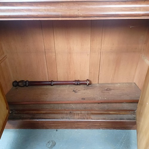 153 - A Victorian mahogany chiffonier with a mirrored back, the base with a marble top, and two mirrored c... 