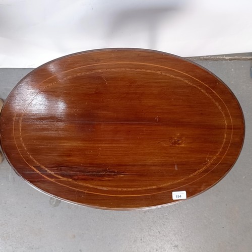 155 - A Edwardian mahogany oval lamp table, 70 cm wide