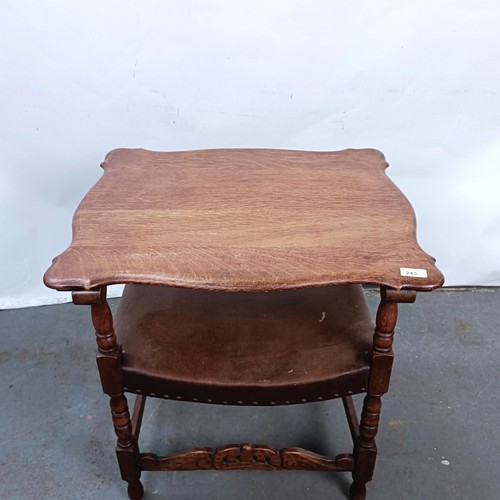 243 - An 18th century style oak chair table, 58 cm wide