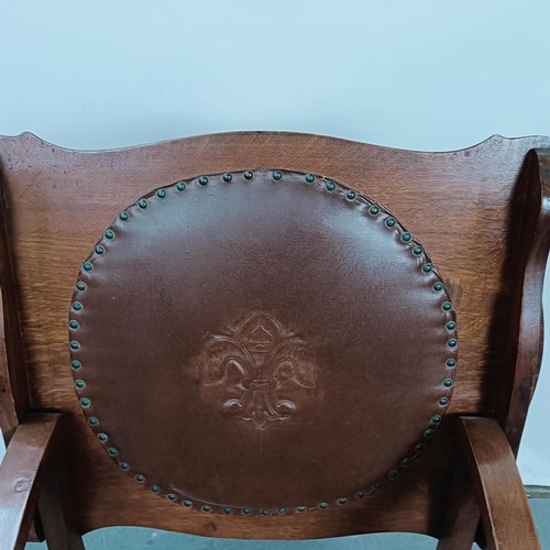 243 - An 18th century style oak chair table, 58 cm wide