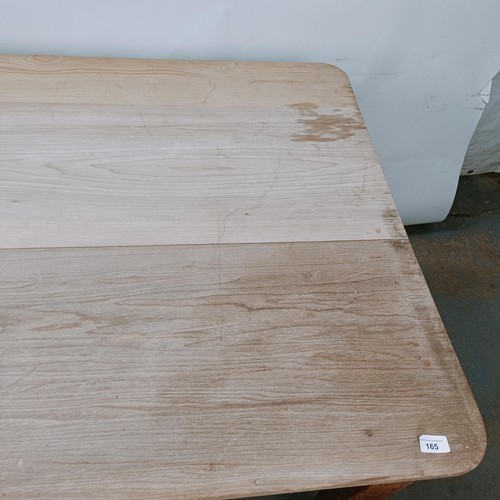 165 - A Victorian pine kitchen table, with a single frieze drawer, the top 168 x 92 cm