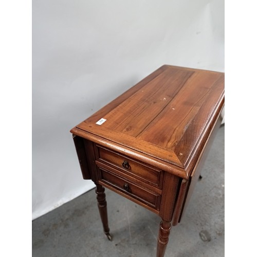 171 - A French walnut work table, with four frieze drawers, on turned legs, 85 cm wide