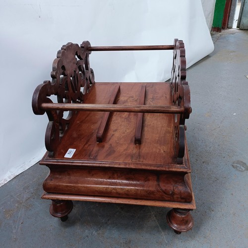 172 - A Victorian walnut Canterbury, 60 cm wide