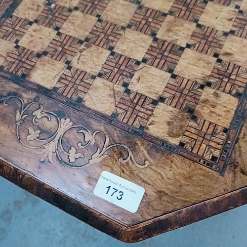 173 - A Victorian work table, the top inset with for chess board