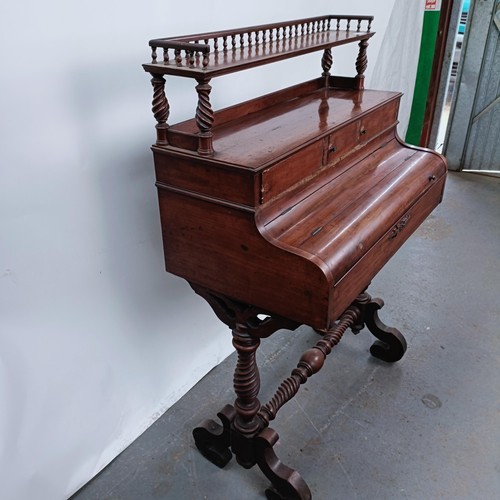 178 - An early 20th century Continental writing desk, with a raised back, the hinged top to reveal a writi... 