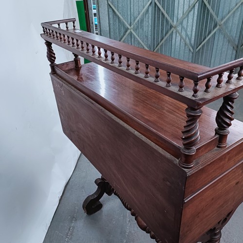 178 - An early 20th century Continental writing desk, with a raised back, the hinged top to reveal a writi... 