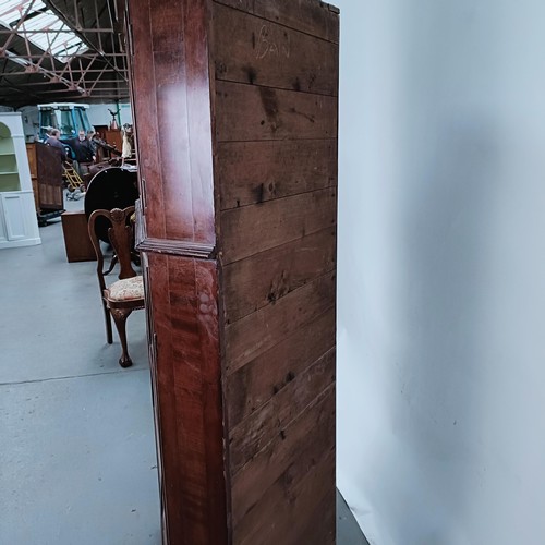 180 - A Victorian mahogany corner cabinet, the top with two glazed doors, the base with two glazed doors, ... 