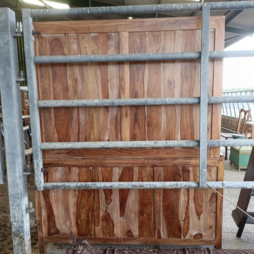 1 - A hardwood display cabinet, with three glazed doors, on a base with three drawers and three cupboard... 