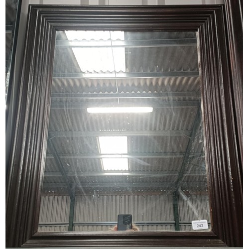 242 - A walnut framed wall mirror, 70 x 60 cmPlease note collection is from TA9 4LJ only on 22nd, 23rd, 24... 