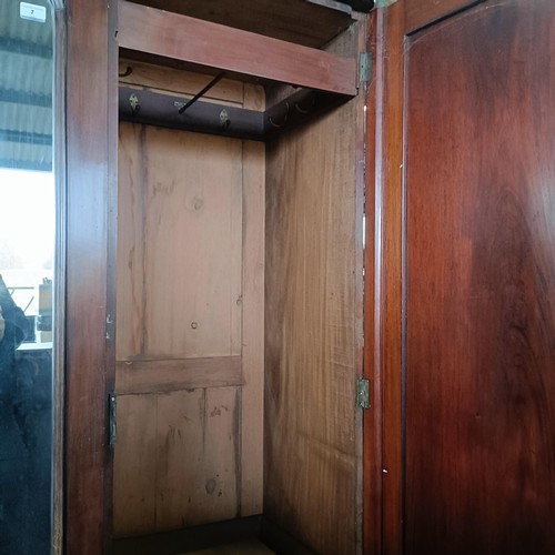 7 - A mahogany triple wardrobe, with a central mirrored door, 120 cm widePlease note collection is from ... 