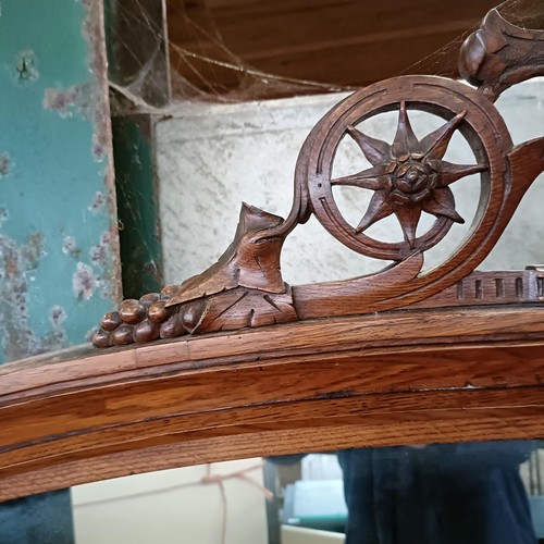 9 - A 19th century oak sideboard, with a raised mirrored back, 216 cm wide<br /><br />Please note collec...