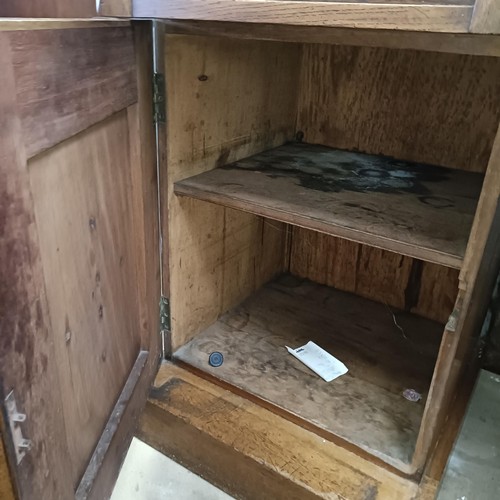 9 - A 19th century oak sideboard, with a raised mirrored back, 216 cm wide<br /><br />Please note collec...