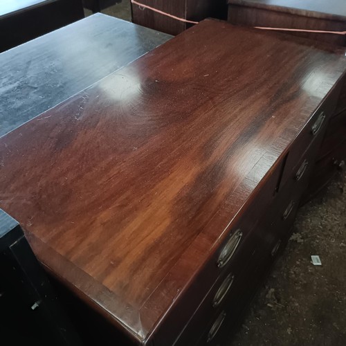 15 - A mahogany chest, with two short and three long drawers, 110 cm wide<br /><br />Please note collecti...