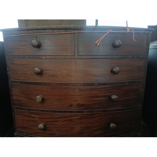 16 - A 19th century mahogany bow front chest, with two short and three long drawers, 120 cm<br /><br />Pl...