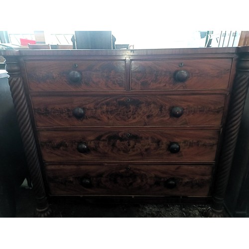 18 - A mahogany chest, with two short and three long drawers spiral turned supports, 136 cm wide<br /><br...