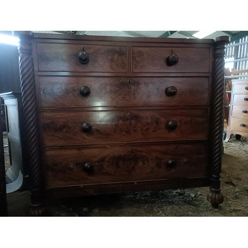 18 - A mahogany chest, with two short and three long drawers spiral turned supports, 136 cm wide<br /><br...