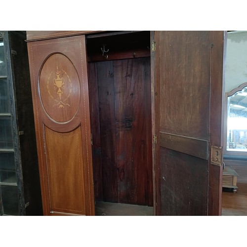 42 - An early 20th century wardrobe, 102 cm wide, and a dressing chest, 106 cm wide<br /><br />Please not...