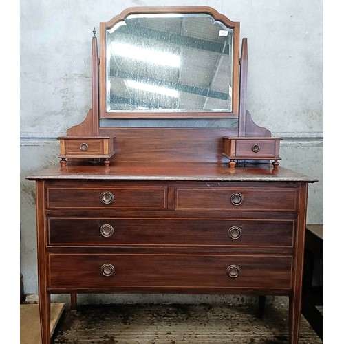 42 - An early 20th century wardrobe, 102 cm wide, and a dressing chest, 106 cm wide<br /><br />Please not...