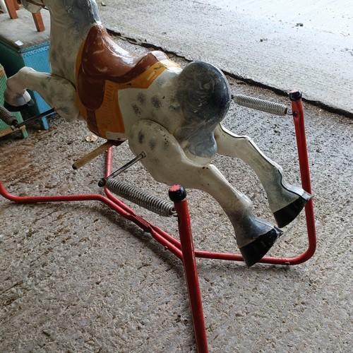 54 - A vintage Mobo painted metal rocking horse, 88 cm wide<br /><br />Please note collection is from TA9...