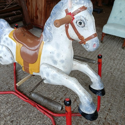 54 - A vintage Mobo painted metal rocking horse, 88 cm wide<br /><br />Please note collection is from TA9...