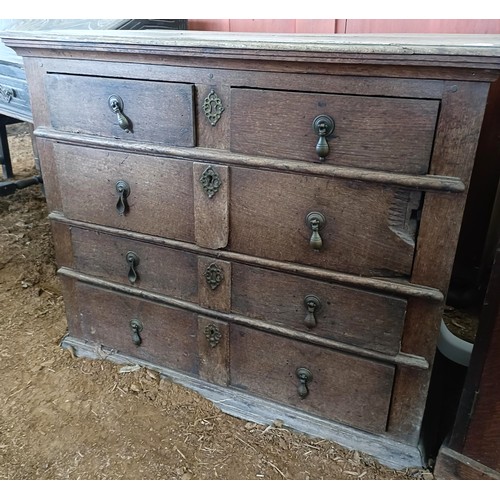 22 - An 18th century oak chest, with two short and three long drawers, 104 cm widePlease note collection ... 