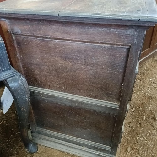 22 - An 18th century oak chest, with two short and three long drawers, 104 cm wide<br /><br />Please note...