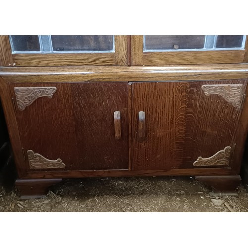 24 - An Art Deco oak display cabinet, 85 cm wide<br /><br />Please note collection is from TA9 4LJ only o...