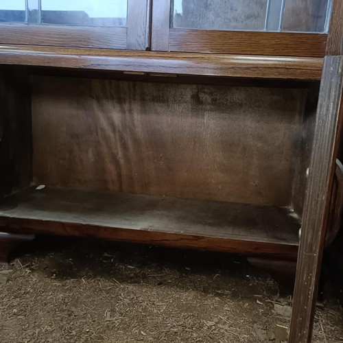 24 - An Art Deco oak display cabinet, 85 cm wide<br /><br />Please note collection is from TA9 4LJ only o...