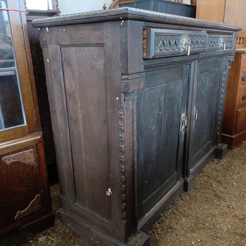 25 - An oak sideboard, 132 cm widePlease note collection is from TA9 4LJ only on 22nd, 23rd, 24th & 2... 